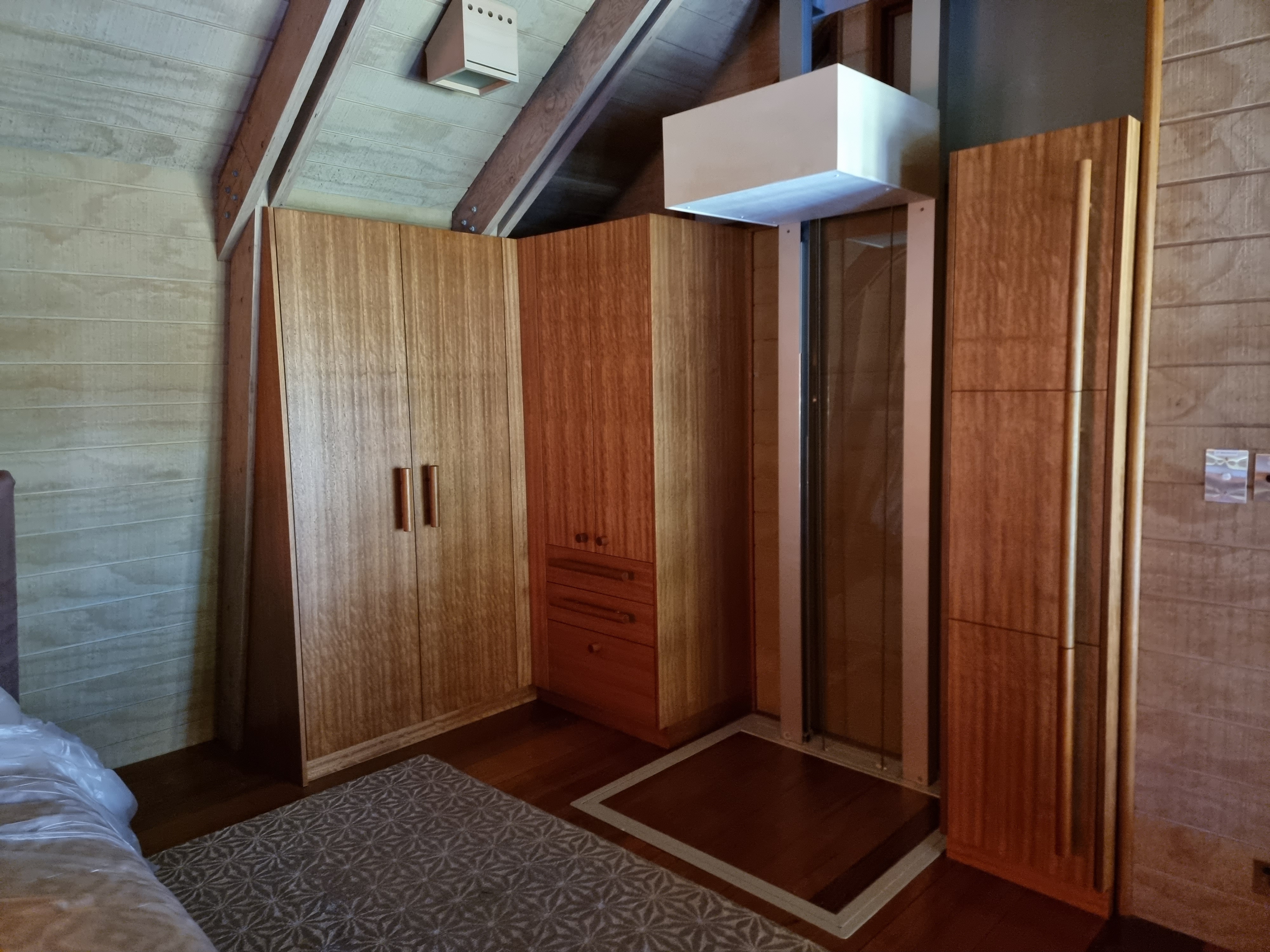 Stained and oiled timber bedroom built-ins — interior timber restoration